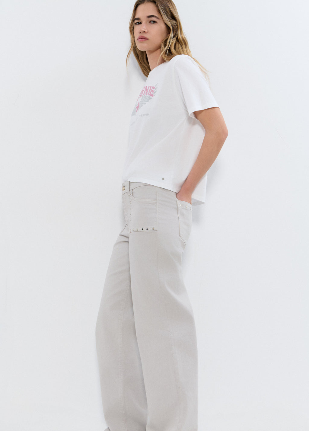 Pantaloni dritti con borchie