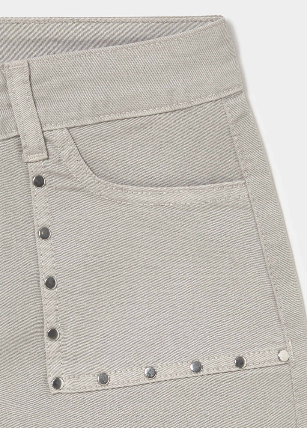 Pantaloni dritti con borchie