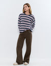 Relaxed pants with studs and rolled-up hem