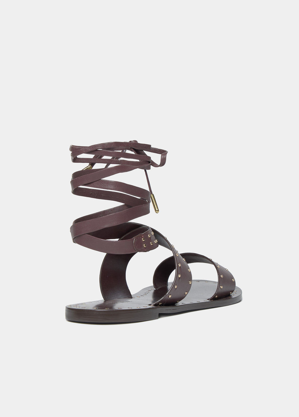Flat sandals with studs and ties