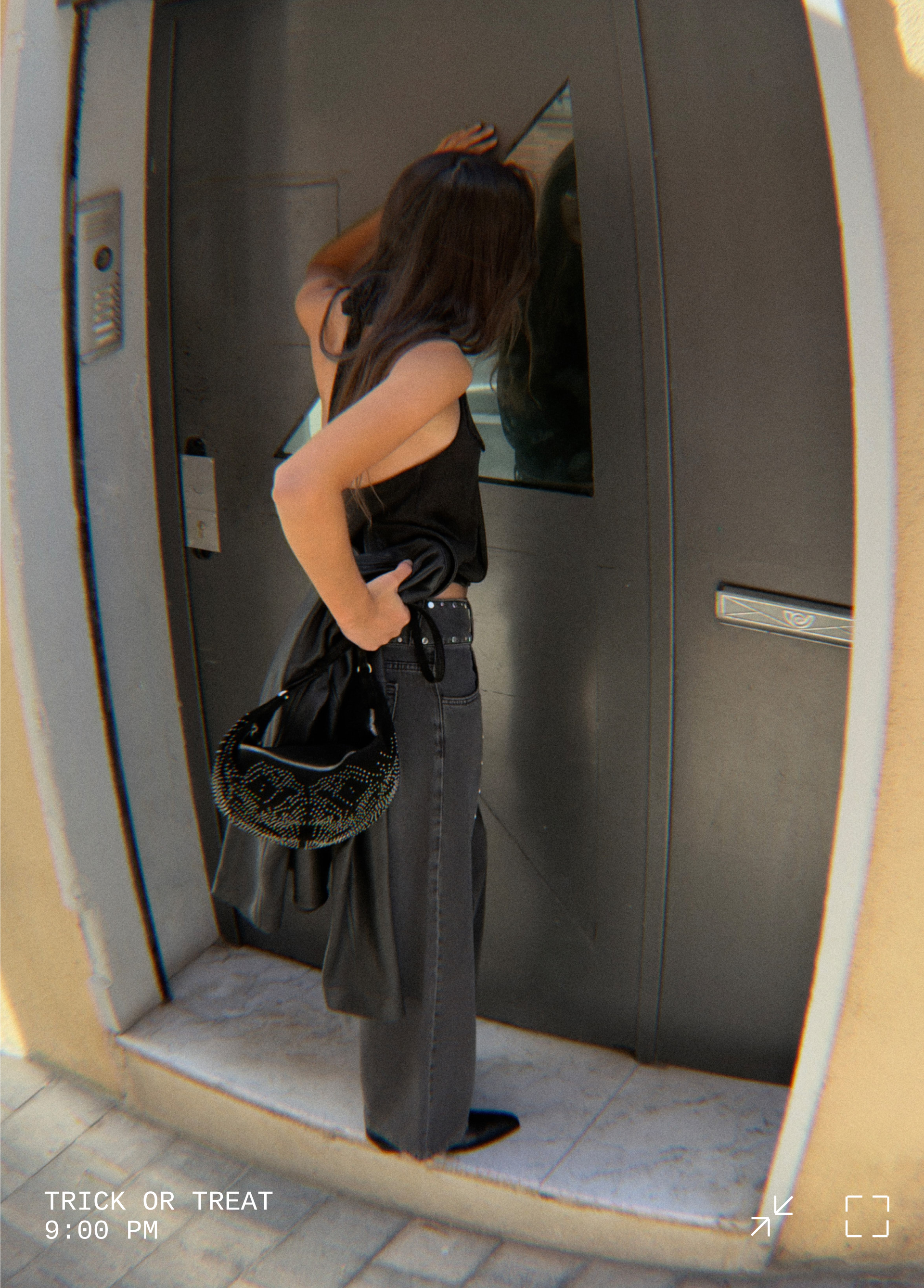 Bolso bandolera tachas