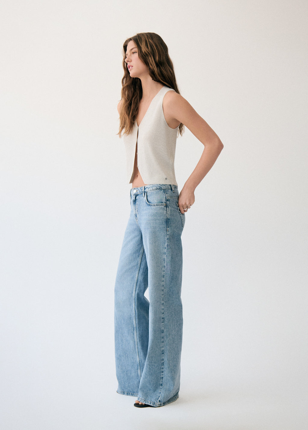 Top gilet con bottoni