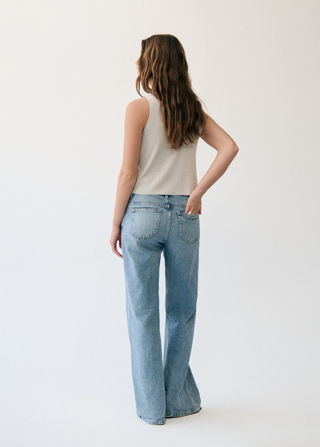 Top gilet con bottoni